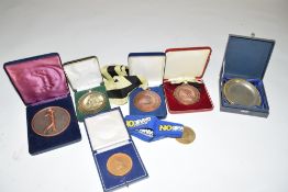 Six various modern cased presentation medallions to include The Benson & Hedges Gold Award, The