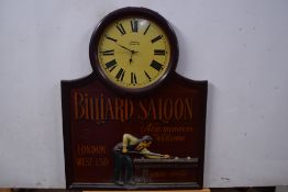 Contemporary wall clock and advertising board marked 'Billiard Saloon London West End', set in a