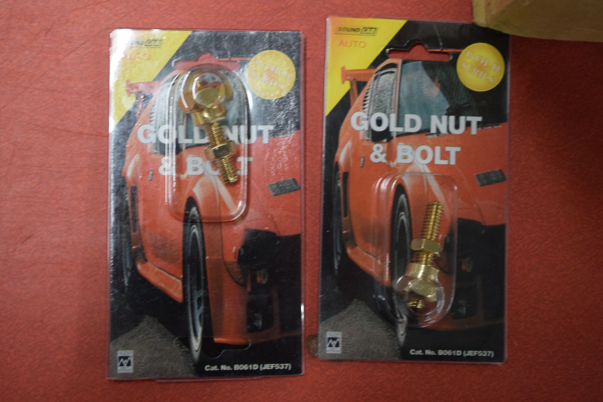 TWO BOXES CONTAINING SOUND LAB AUTO GOLD NUT AND BOLT CONNECTORS, APPROX 20 PIECES PER BOX