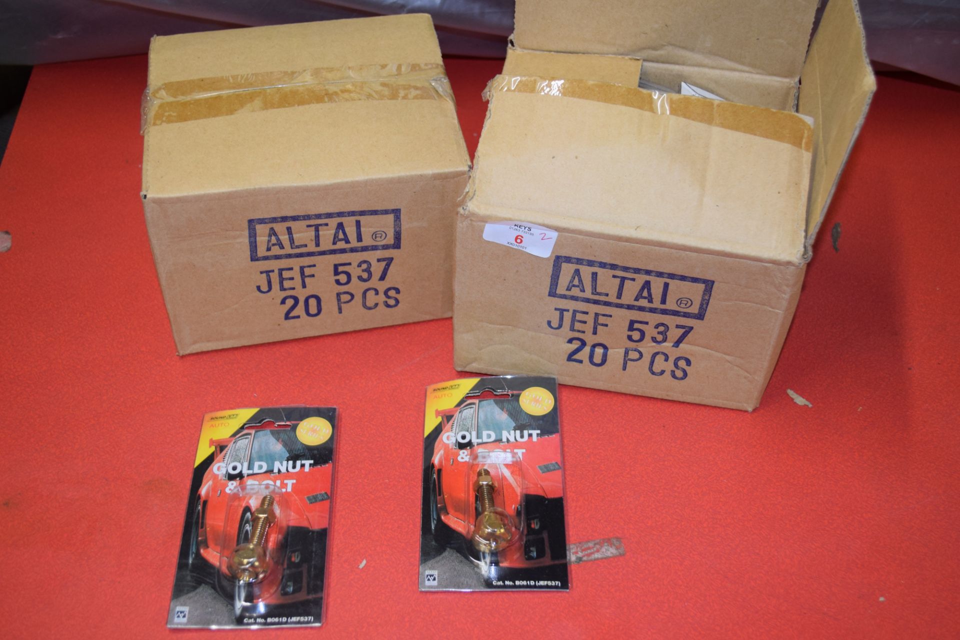 TWO BOXES CONTAINING SOUND LAB AUTO GOLD NUT AND BOLT CONNECTORS, APPROX 20 PIECES PER BOX