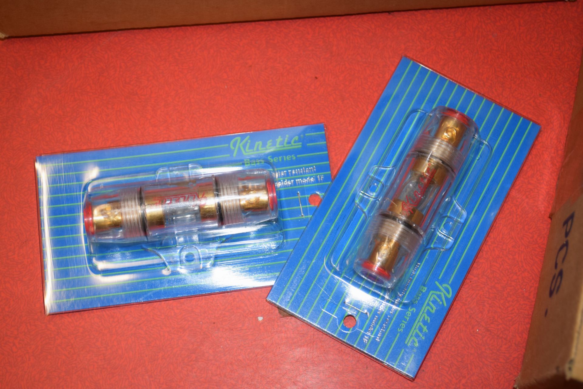 TWO BOXES CONTAINING KINETIC BASE SERIES HIGH QUALITY WATER RESISTANT GOLD PLATED FUSE HOLDER