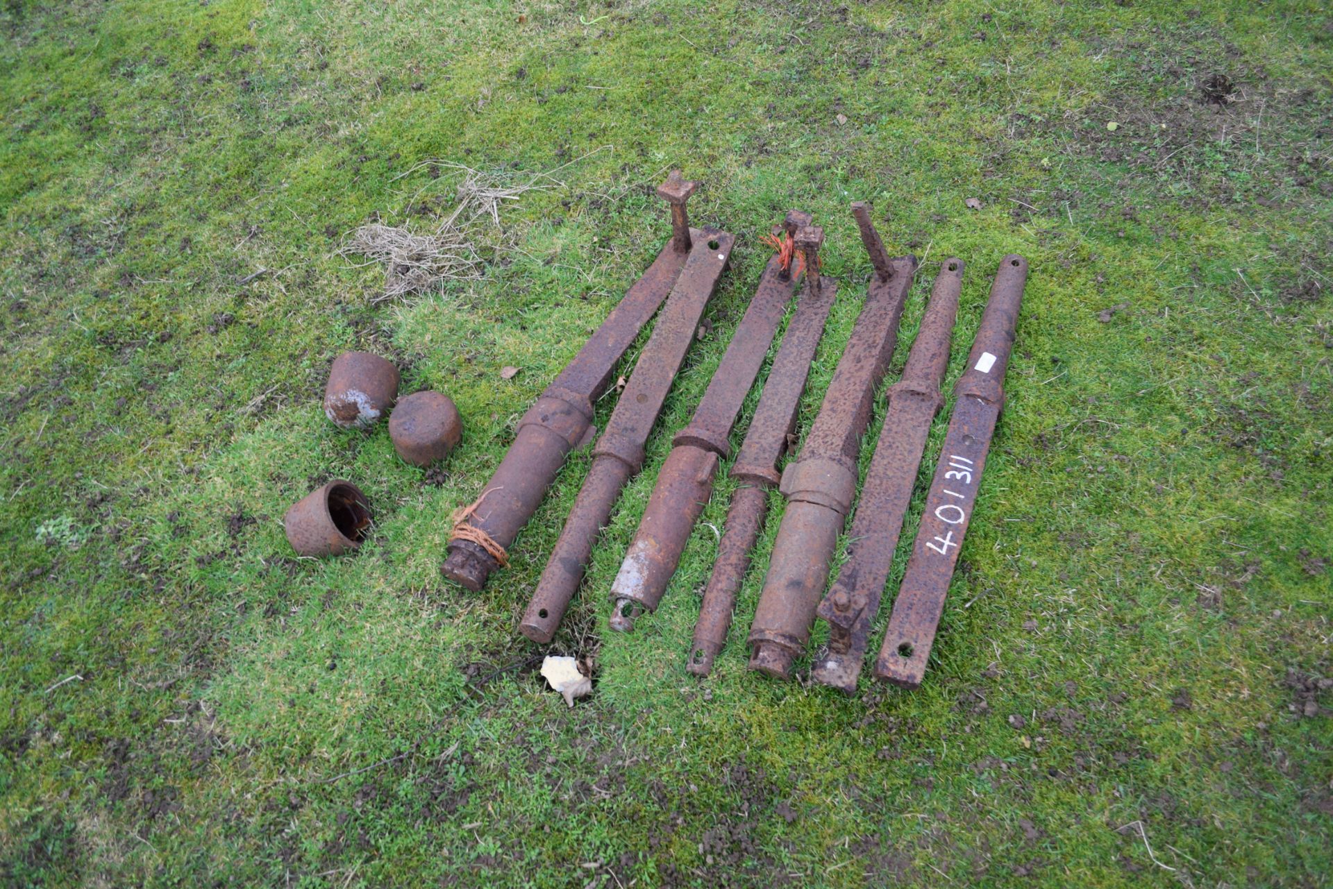 Collection of six various iron axles