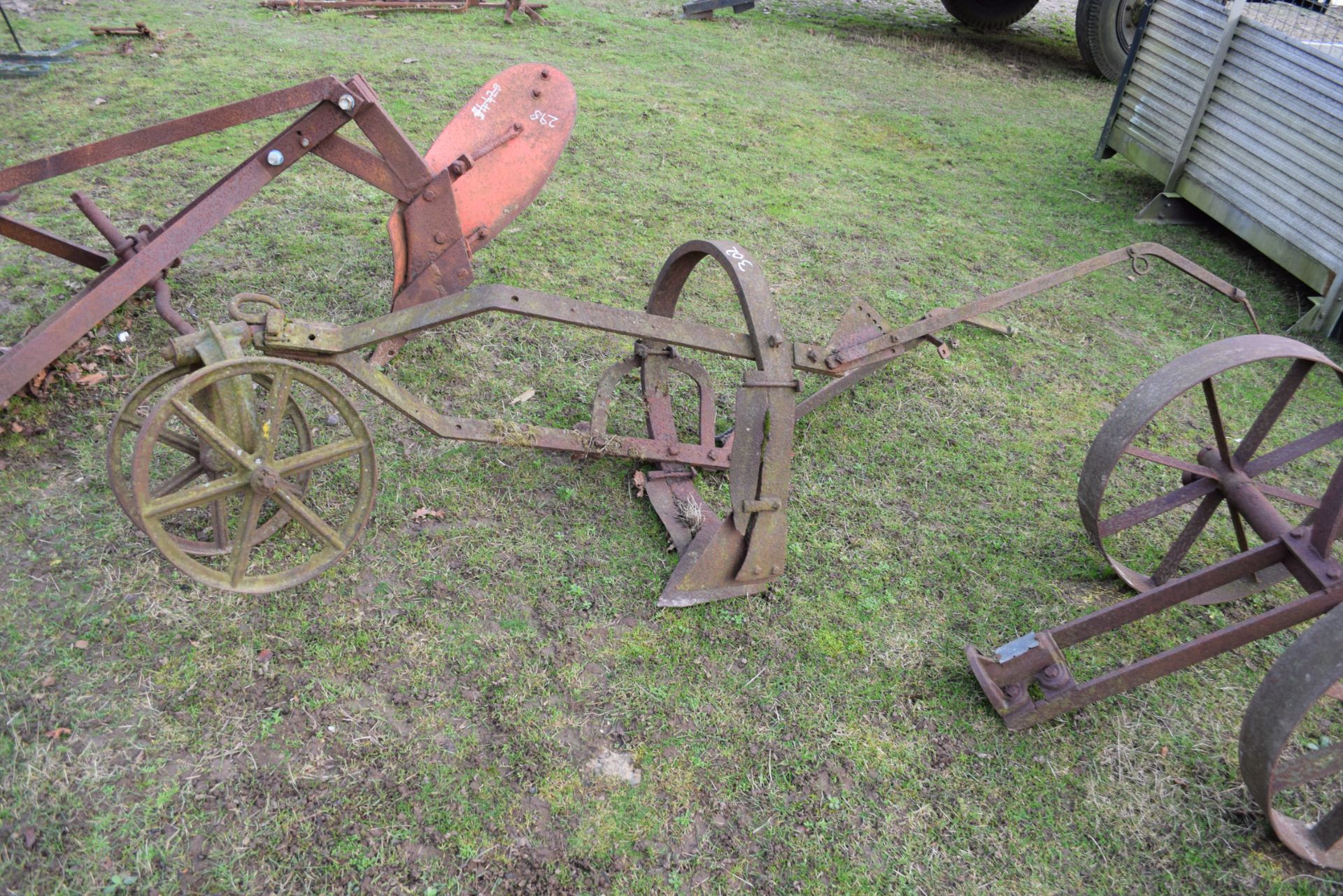 Vintage iron horse-drawn plough or cultivator (a/f)