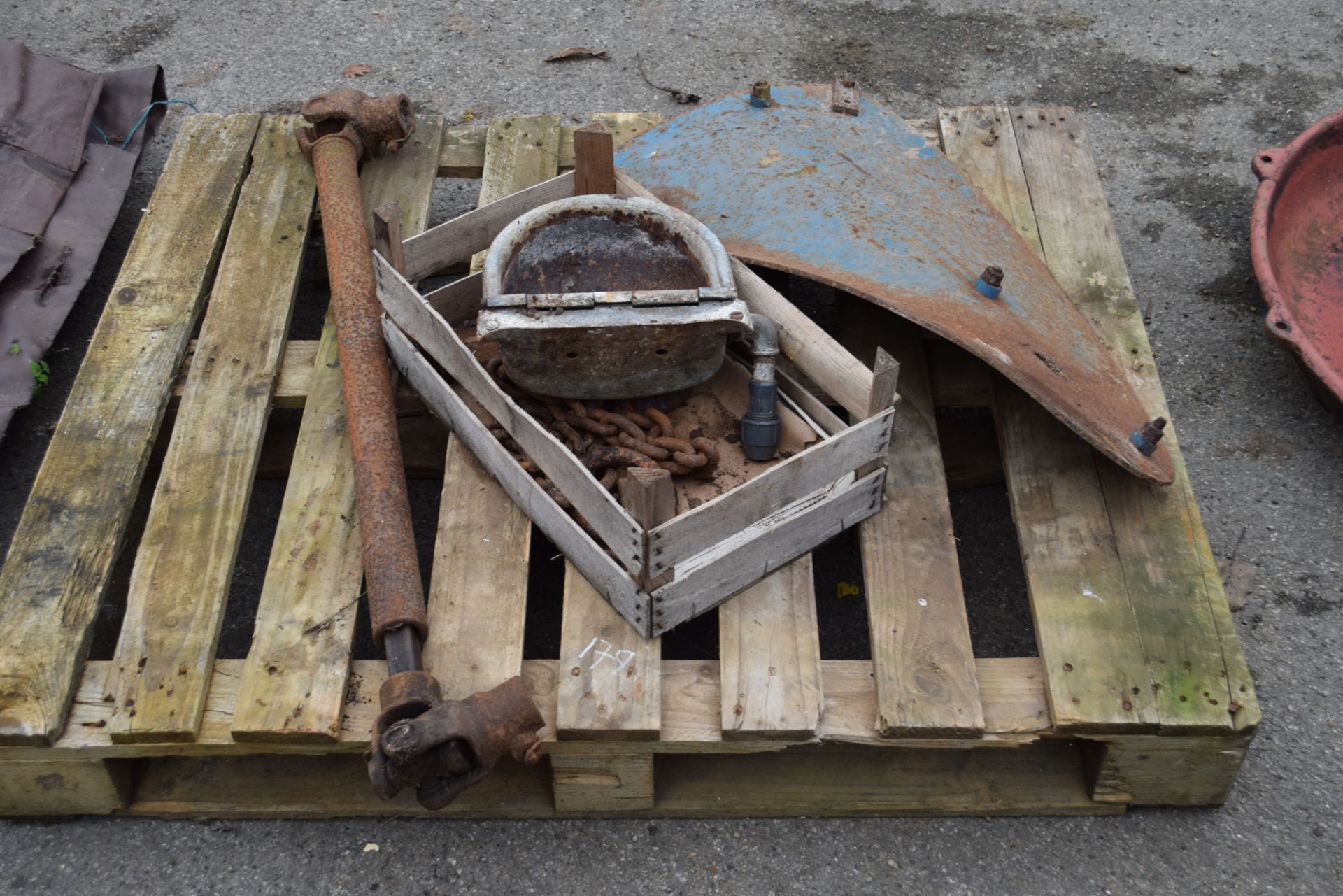 Pallet containing farm clearance items including a tractor drive shaft, chains, galvanised - Image 2 of 2