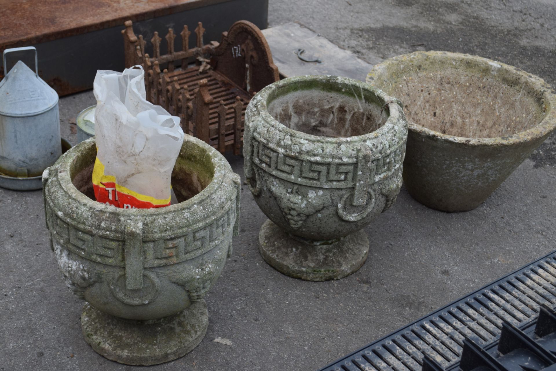 Pair of stone garden urns, width approx 35cm x 38cm high, and a composite garden planter