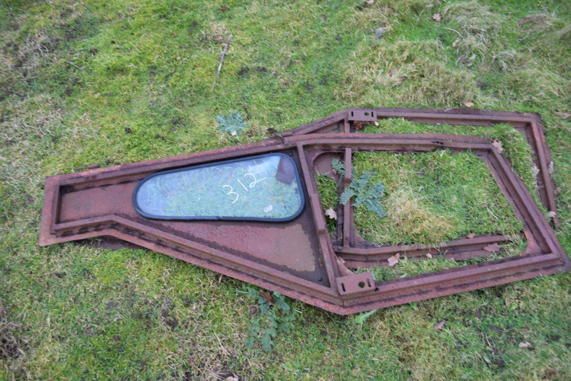 Pair of vintage iron framed tractor doors