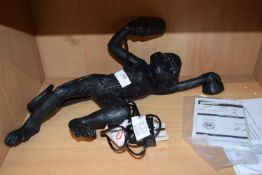 Kinfield one light wall fitting in the form of a monkey