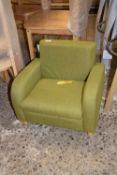 Upholstered child's armchair, colour green