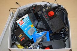 Box of various Hornby and other model railway control units and related plugs and cables