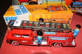 Vintage Chinese metal fire truck with friction movement with siren