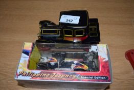 Boxed Philippines Jeepney together with a further Japanese metal model vintage car (2)