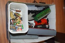 Small box various 0 gauge model railway items to include three Esso tankers, various carriages, coal
