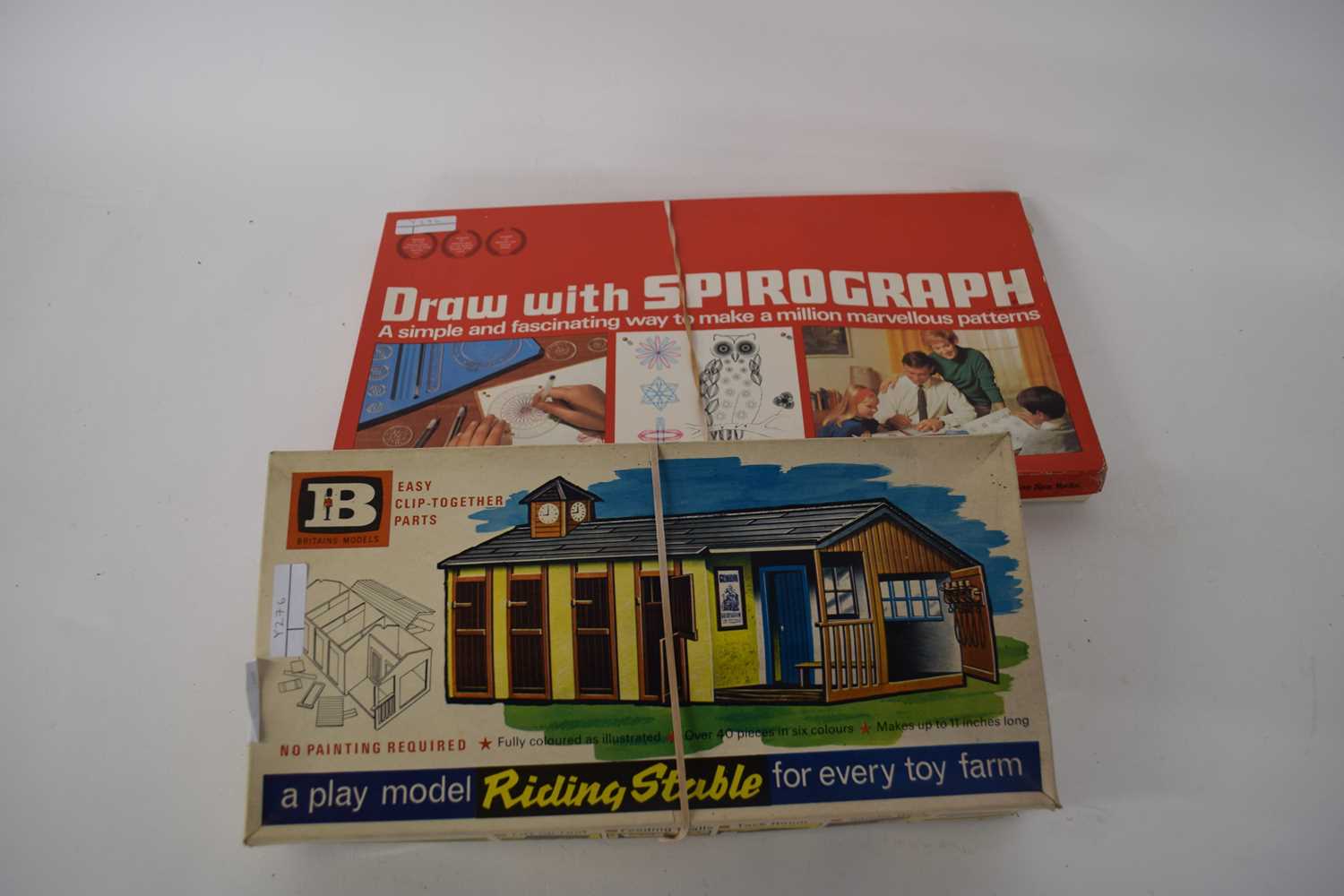 Britains models riding stable together with a vintage Spirograph drawing set