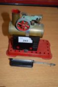 Small methanol engine set on red metal base, unbranded, 14cm high
