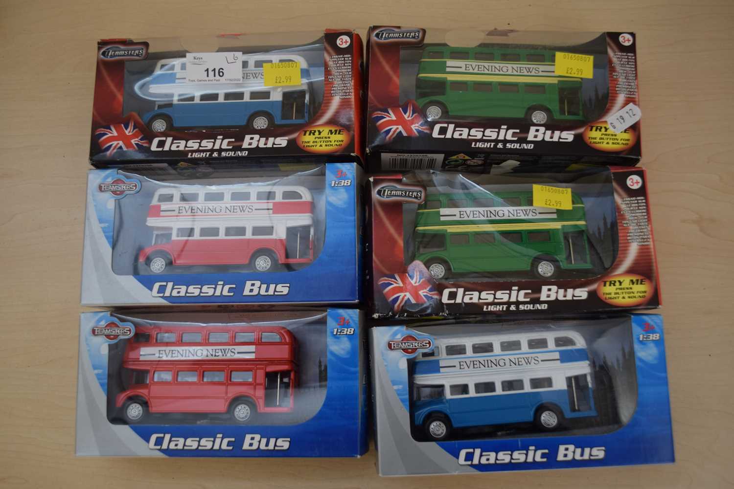 Teamsters group of six classic bus models, all displaying Evening News advertising in different