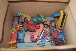Box of vintage Dinky toys to include various farm implements, trailers, elevator loader, heavy