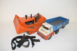 Vintage Tri-ang metal truck together with a vintage plastic bodied battery operated bulldozer