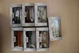 Exclusive First Editions four various 00 scale die-cast model buses and three lorries, all boxed (