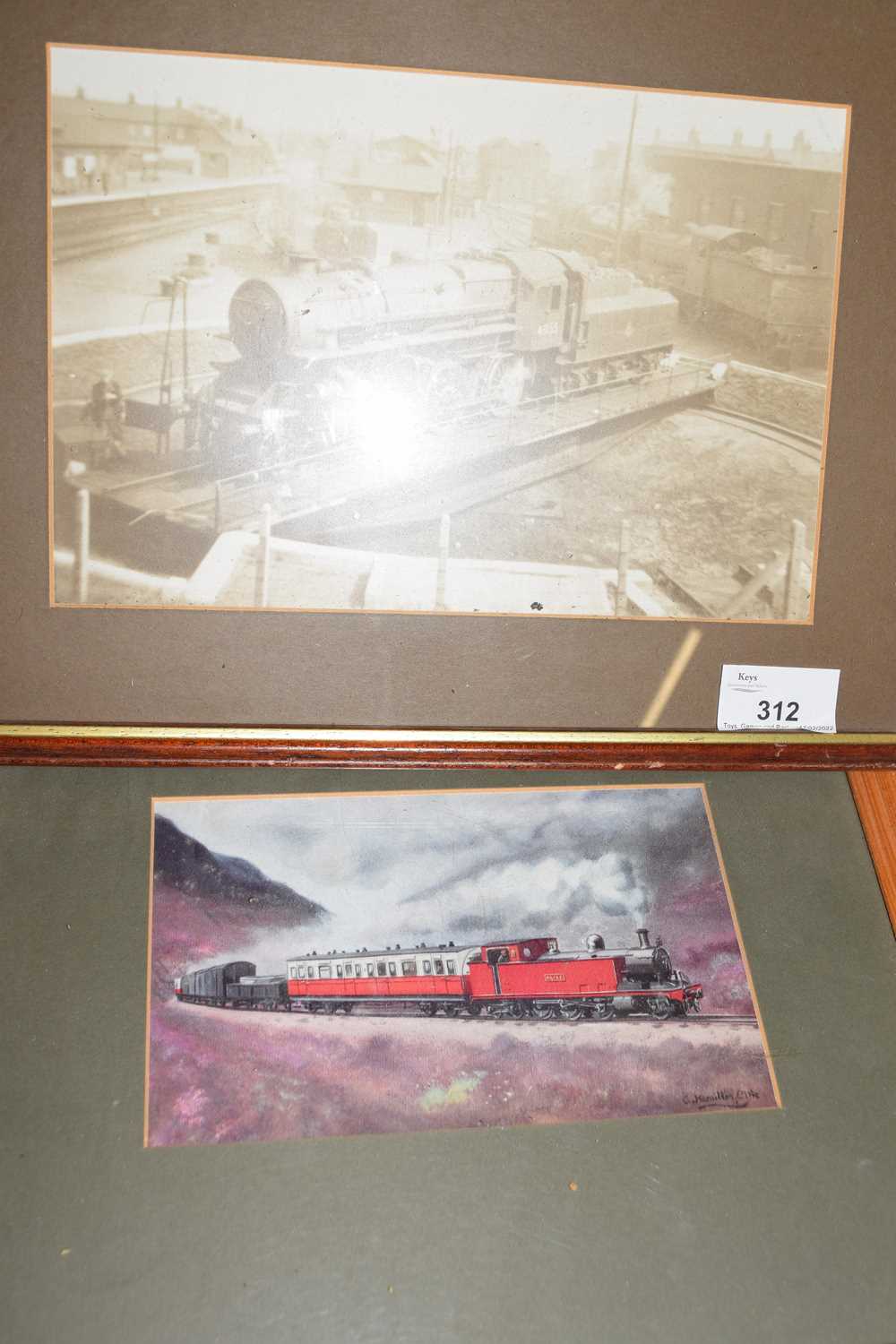 Framed black and white photograph of a locomotive together with a framed coloured print of a
