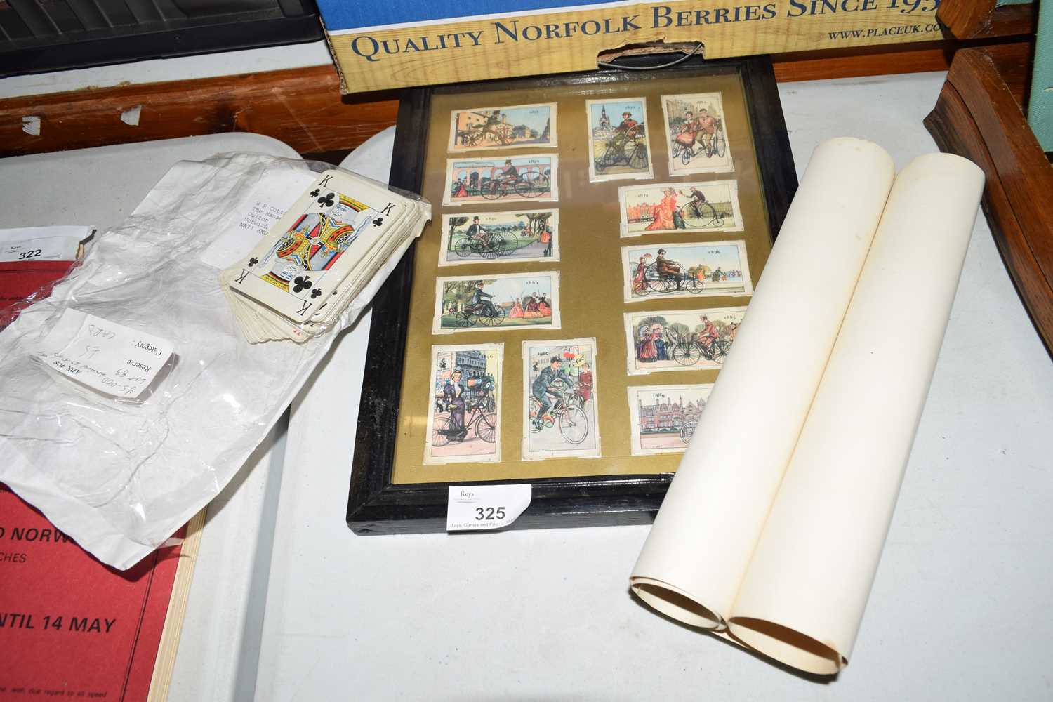 Mixed Lot comprising framed set of cards showing the evolution of the bicycle, together with print