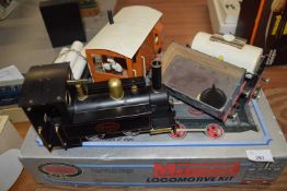Mamod locomotive kit together with accompanying wagons