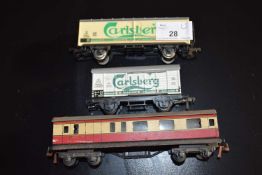 00 gauge rolling stock comprising Trix metal carriage, Carlsberg metal and plastic goods wagon and a