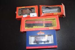 Mixed Lot: 00 gauge rolling stock comprising a Tri-ang cement wagon Blue Circle, a Tri-ang guards