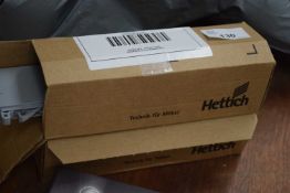Two Hettich soft closing fittings