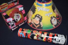 4 'The Beano' Collectors items, light Shade, Postcard set, Dennis the menace skate board toy and a