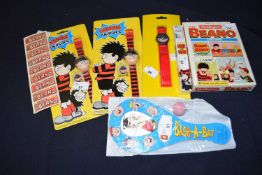 7 'The Beano' collectors items to include watches, Bash-a-bat, The Beano Card game etc