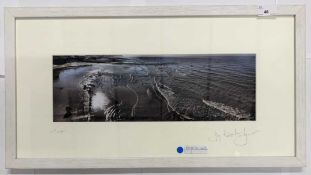 Contemporary photographic print of an unidentified coast, indistinctly signed lower right in pencil,