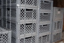 Twenty eight grey stacking storage/transit crates for glass ware