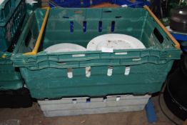 Two crates containing mixed china ware to include serving plates and dinner plates