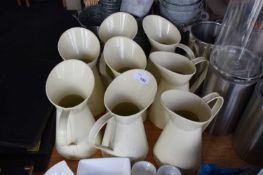 Vintage tin milk jugs