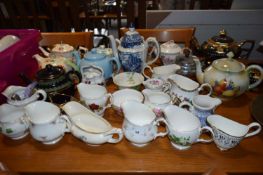 Quantity of various china teapots, milk jugs etc
