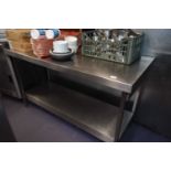 Free standing stainless steel work station, width 150 cm, height, 85 cm, depth 65 cm