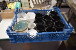 Crate containing a mixed quantity of various serving dishes