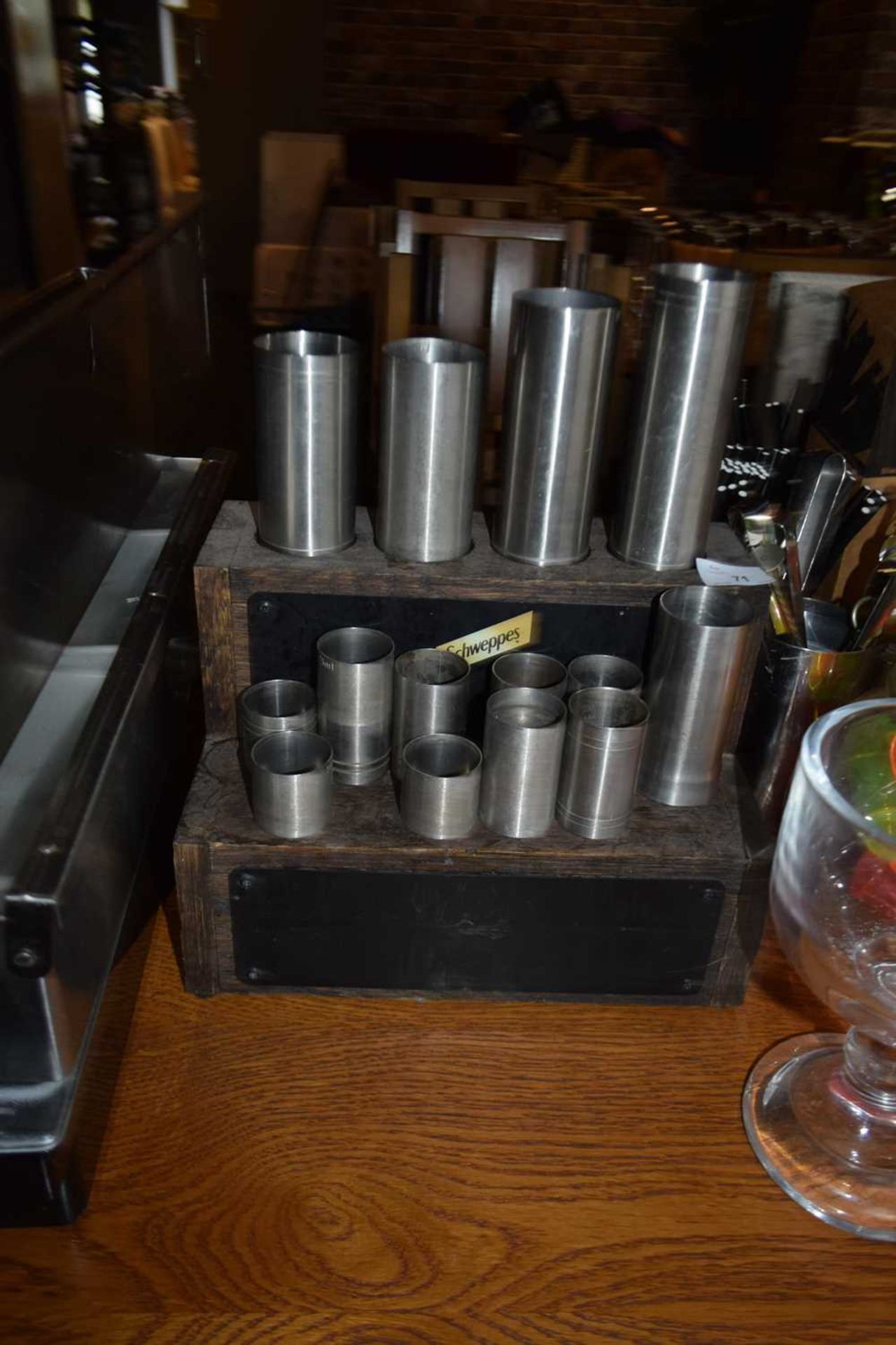 Schweppes stainless steel thimble bar measures set with display stand