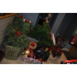 Large quantity of Christmas decorations together with Christmas trees, garlands etc