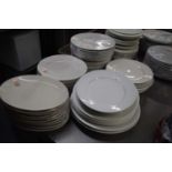 Large quantity of mixed serving plates