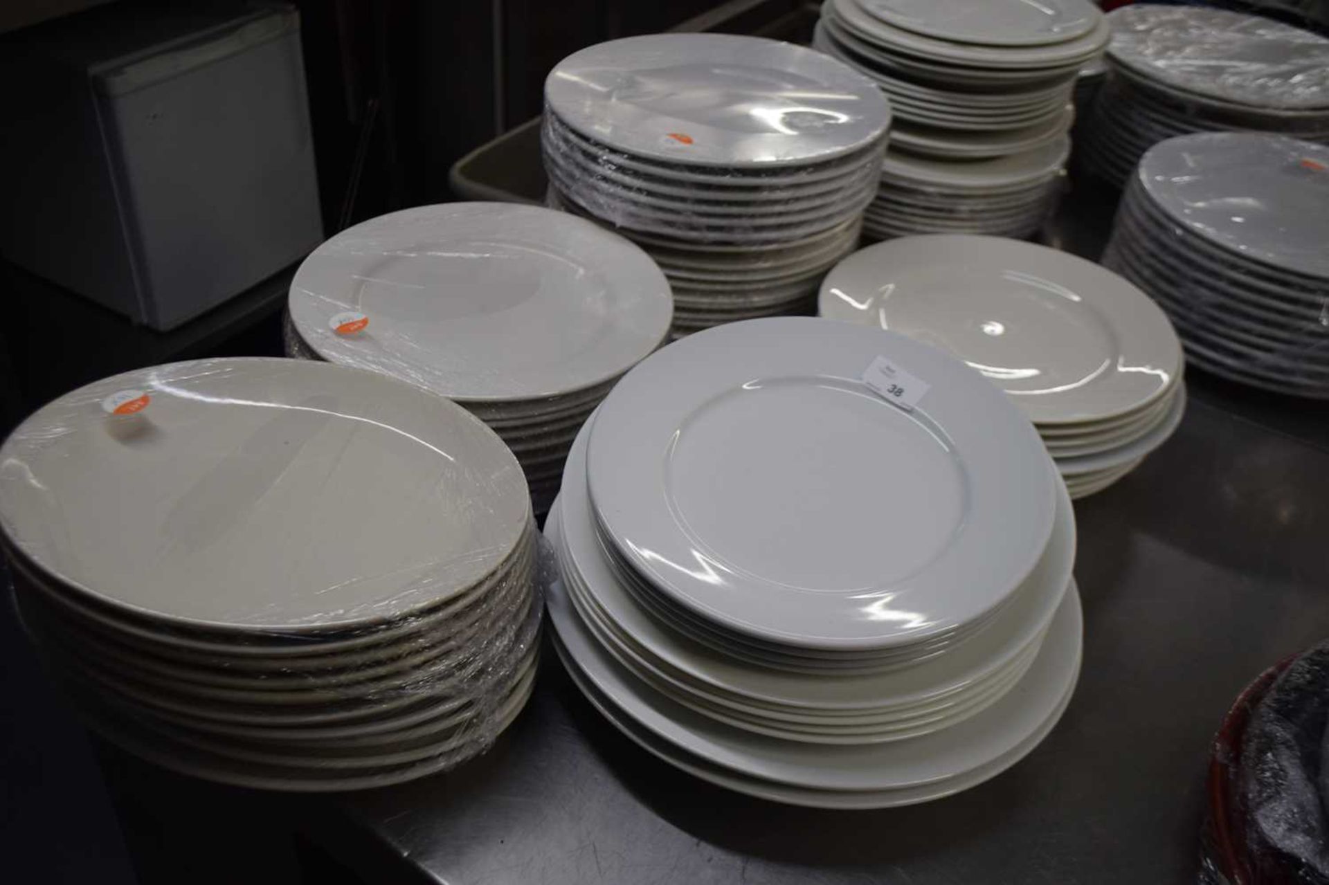 Large quantity of mixed serving plates