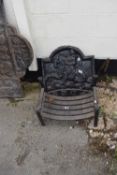 Vintage cast iron fire back together with fire basket, width approx 55cm, height 50cm