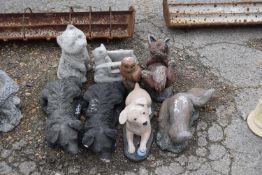 Mixed lot of various garden composite statues to include dogs, owls etc (8)