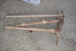 Mixed lot of garden tools to include pick axes etc