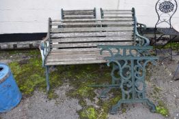 Cast iron garden set together with two chairs including a set of cast table ends