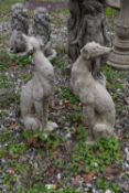 Pair of composite seated whippets (small), height 55cm