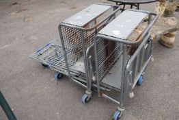 Two metal trolleys