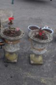 Two composite garden urns/planters, height 50cm