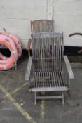 Two teak garden chairs