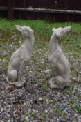 Pair of composite seated whippets (medium), height 70cm